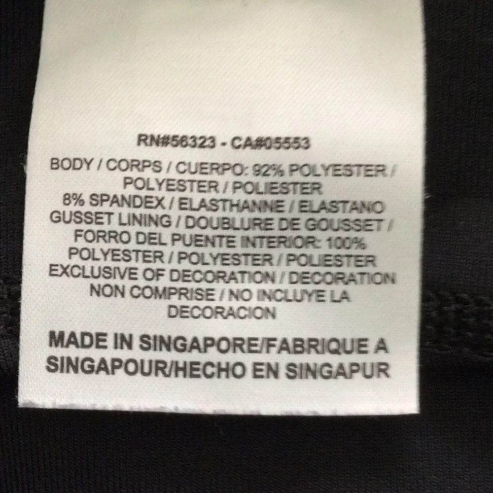 Woman’s Nike Running size M washable color black & purple.    #432